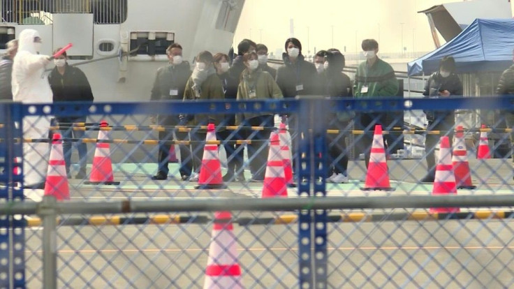 Virus-cleared passengers are let off the Diamond Princess in Yokohama, Japan
