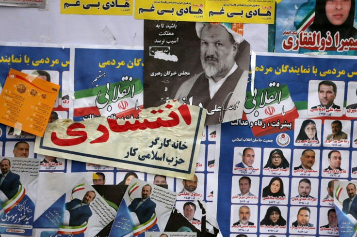 Iranian election posters and fliers in Tehran on the last day of campaigning on Wednesday