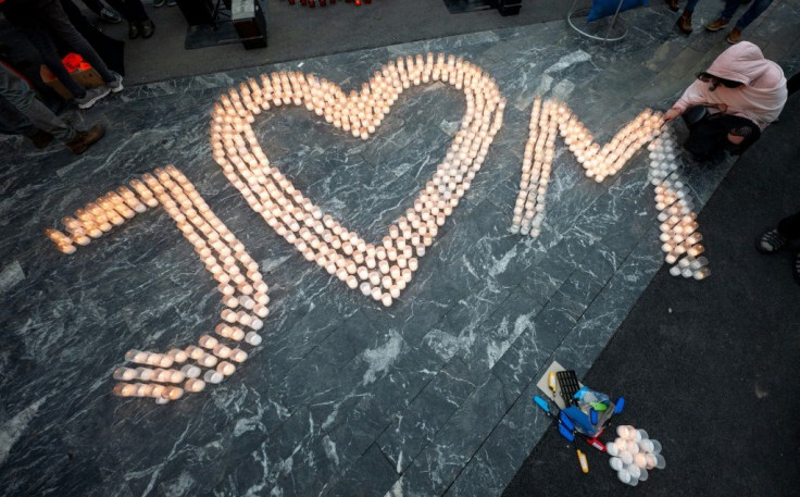 Candles were lit spellng out the love between, and for, Jan Kuciak and his fiancee Martina Kusnirova who were gunned down two years ago