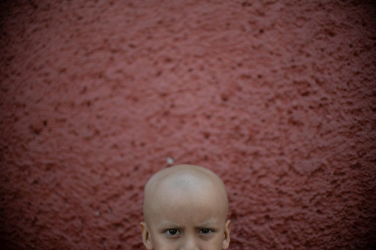 Little Hermes plays outside his hospital in Mexico City