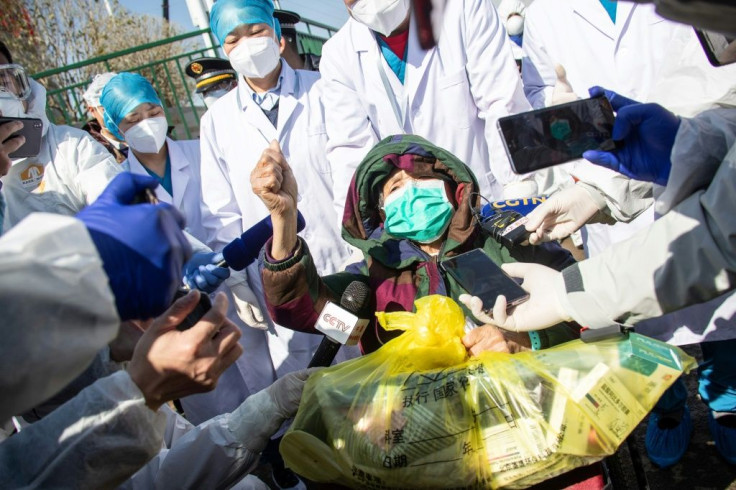 A recovered 83-year-old patient in a wheelchair is discharged from Leishenshan Hospital, a newly built makeshift hospital for novel coronavirus patients in Wuhan, the epicenter of the outbreak