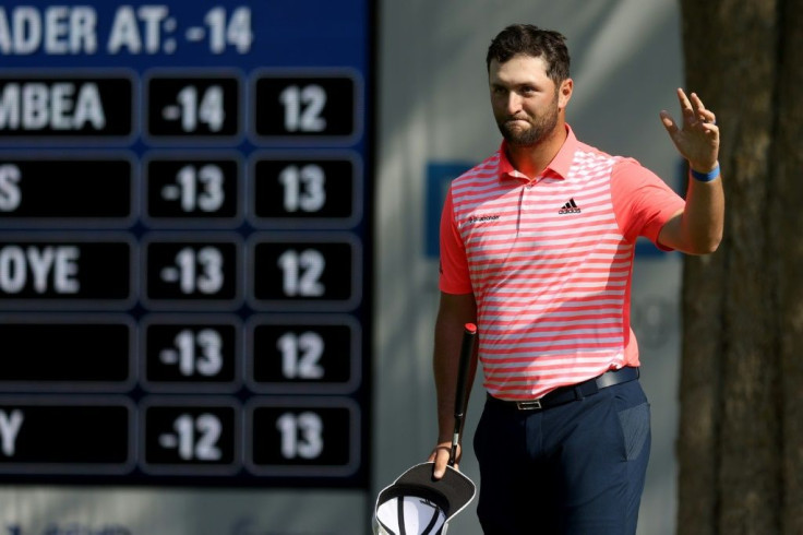 Spain's Jon Rahm celebrates after firing a course-record 61 in the third round of the WGC Mexico Championship