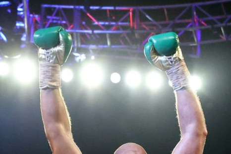 Tyson Fury celebrates his seventh-round TKO triumph in his WBC heavyweight world title rematch against Deontay Wilder