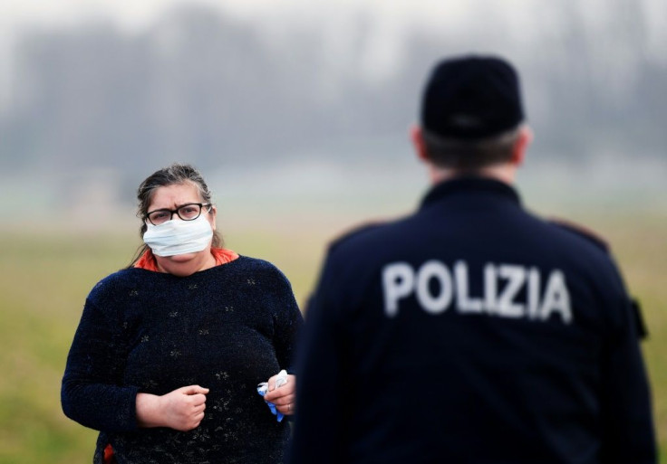 Police setting up checkpoints said they would enforce a blockade which Italy's prime minister warned could last for weeks
