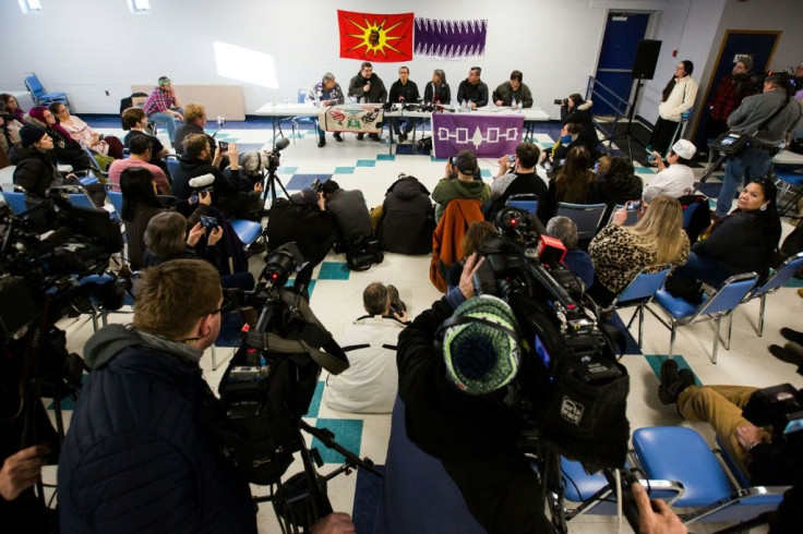 Wet'suwet'en hereditary chiefs and community members address a press conference at the Mohawk Community Centre in Tyendinaga, Ontario, on February 21, 2020 as protests rage against a natural gas pipeline in British Columbia