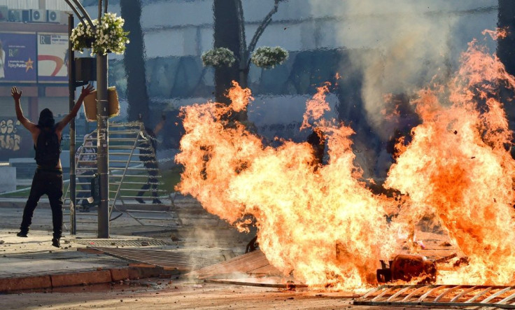 Protestors set fires outside the Vina del Mar music festival in Chile on February 23, 2020