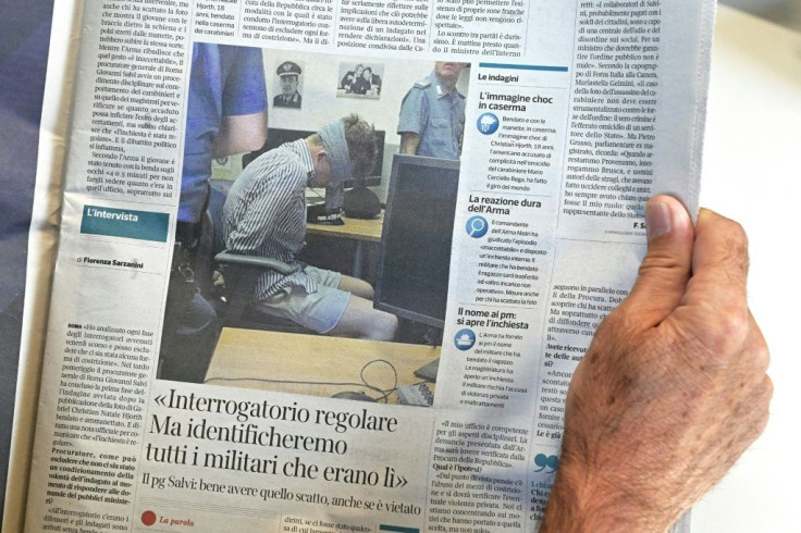 A photograph taken of one of the suspects, Gabriel Natale-Hjorth, blindfolded during interrogation, appeared in media reports, causing outrage