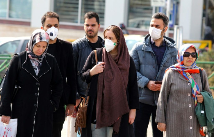 Some Iranians have begun wearing face masks amid a deadly coronavirus outbreak