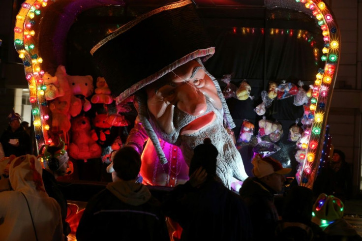 A float caricaturing an orthodox jew is paraded on the opening day of the Aalst carnival on Sunday  in Aalst, Belgium.