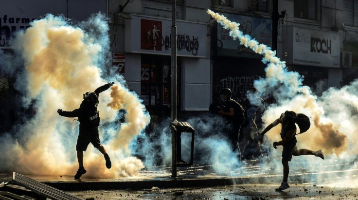 Demonstrators clash with the police in Vina del Mar on Sunday