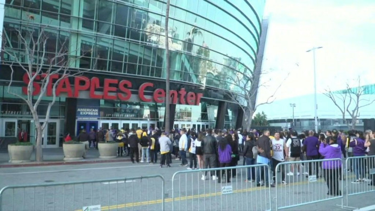 IMAGES Fans gather outside the Staples Center in Los Angeles where a public memorial service for NBA legend Kobe Bryant and his daughter Gianna Bryant will be held.
