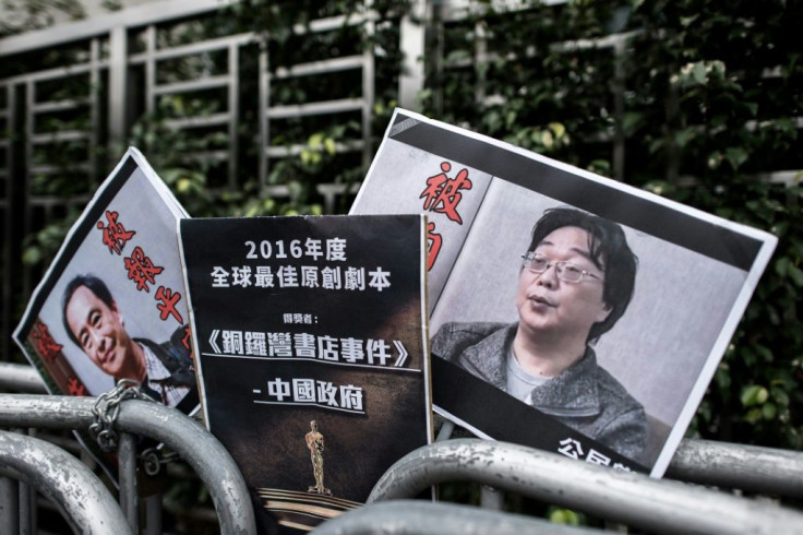 Gui Minhai (R), one of five Hong Kong-based booksellers known for publishing salacious titles about Chinese political leaders was snatched by Chinese authorities while on a train to Beijing in February 2018