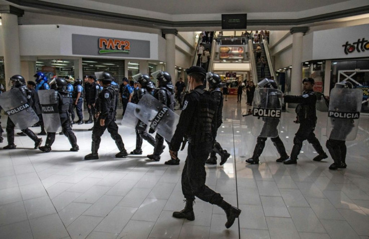Riot police are deployed during an opposition protest at the Metrocentro mall in Managua