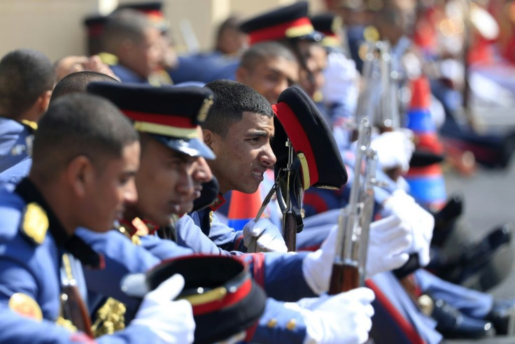 Egyptian honour guards wait as they attend the funeral of former president Hosni Mubarak