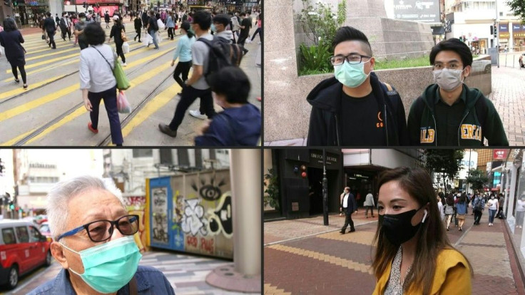 Hong Kongers react to an announcement that the government will give a HK$10,000 ($1,280) handout to each of the seven million permanent residents in a bid to jump-start a recession-hit economy now compounded by the coronavirus outbreak