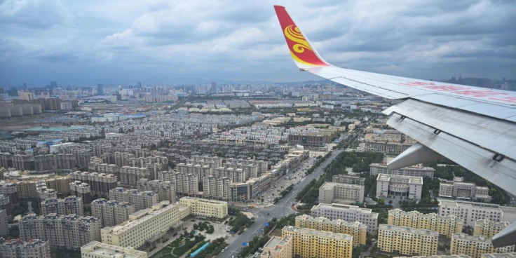 Xinjiang's capital Urumqi is seen from a passenger plane in September 2019