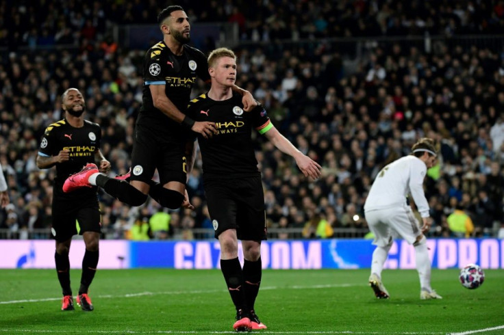 Kevin de Bruyne (right) celebrates scoring a winning penalty as Manchester City beat Real Madrid 2-1 on Wednesday at the Santiago Bernabeu.