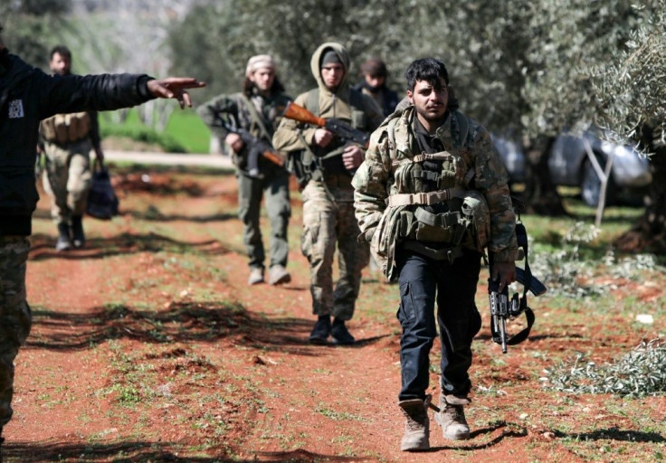 Turkish-backed fighters advance on the key crossroads town of Saraqeb as rebel forces prepare to reverse one of the principal gains of the government's two-month-old offensive