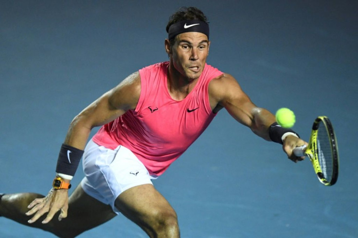 Spain's Rafael Nadal returns the ball to Serbia's Miomir Kecmanovic during their Mexico Open tennis match in Acapulco