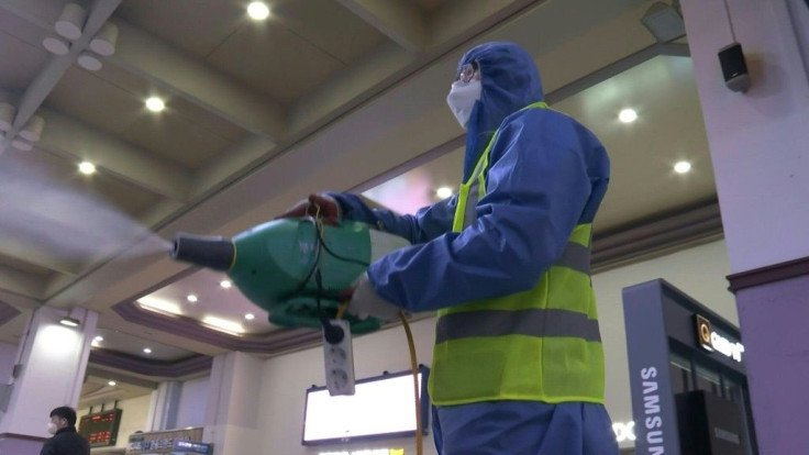 A worker sprays disinfectant at a railway station in Daegu, South Korea's epicentre of the coronavirus outbreak, as part of preventive measures against the spread of the virus