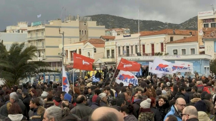 IMAGES Angry Lesbos residents continue to protest the construction of a new camp for migrants after the majority of riot policemen left the island following a day of violent incidents.