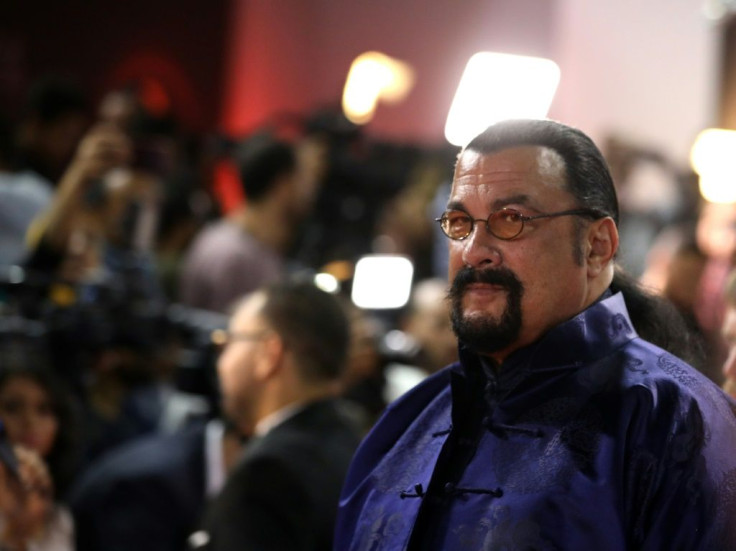 Actor Steven Seagal, shown in 2019 in Egypt, has been suspended from investment promotions over charges he hawked a cryptocurrency venture without disclosing compensation