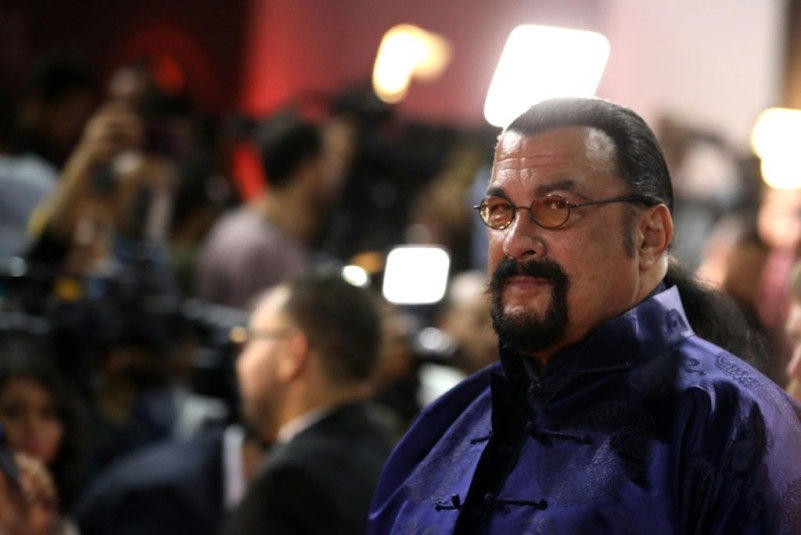 Actor Steven Seagal, shown in 2019 in Egypt, has been suspended from investment promotions over charges he hawked a cryptocurrency venture without disclosing compensation