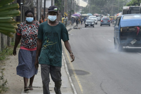 People scrambled to buy face masks and hand sanitiser in Lagos after sub-Saharan Africa's first case of coronavirus was detected