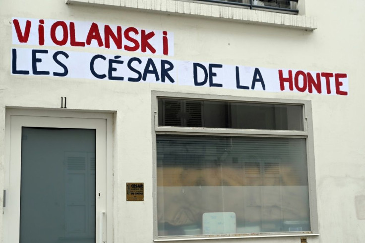 Posters with a play on words combining the word rape in French with the name of Polish-French filmmaker Roman Polanski, and reading "Violanski, the Cesars of shame" plastered on n the headquarters of the French film academy ahead of its 'Cesar' award