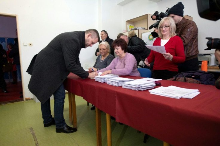 Slovakia's Prime Minister and election leader of the populist-left Smer-Social Democracy (Smer-SD) party, Peter Pellegrini votes in the parliamentary election.