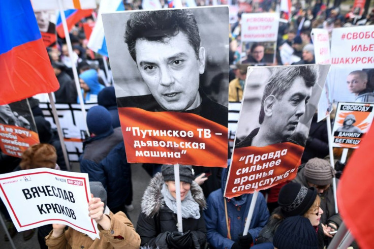 Opposition supporters attend a march in memory of murdered Kremlin critic Boris Nemtsov in downtown Moscow. It is the first such rally since Russia's Vladimir Putin announced controversial changes to the constitution in January.