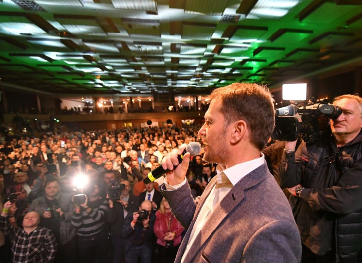 OLaNO party leader Igor Matovic speaks to supporters on his way to a resounding election victory