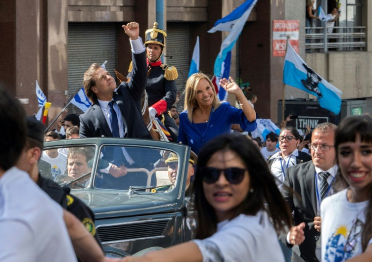 Uruguay's new President Luis Lacalle Pou (L) and Vice-President Beatriz Argimon at his inauguration in Montevideo