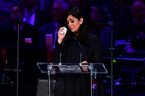 Kobe Bryant's wife Vanessa Bryant wipes away tears as she speaks during the "Celebration of Life for Kobe and Gianna Bryant" at Staples Center. Kobe and Gianna Bryant were among nine people killed in a helicopter crash on January 26