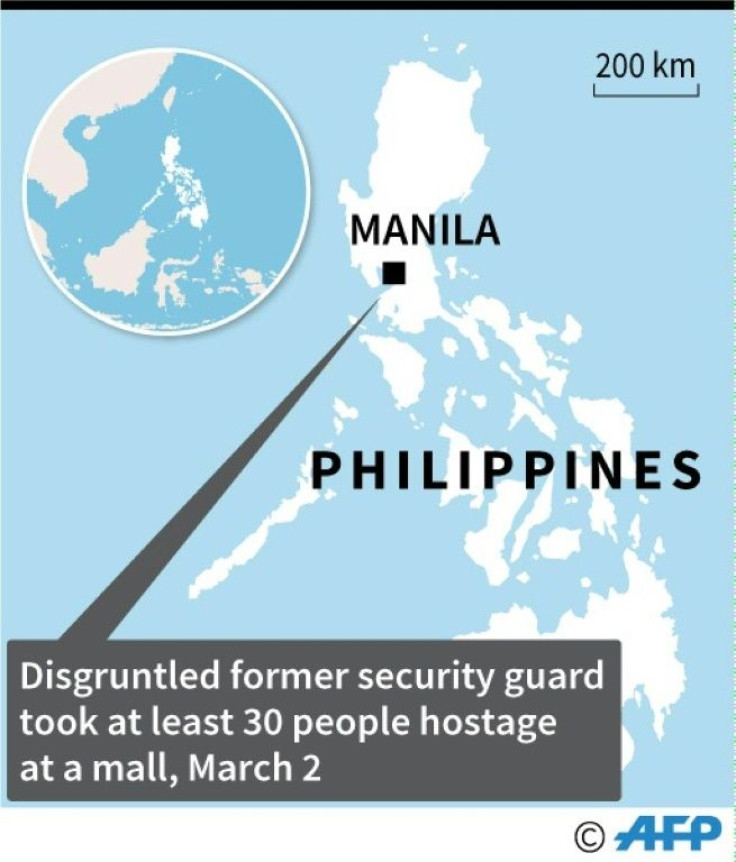 Map locating Manila where a "disgruntled" former security guard shot at least one person and took about 30 others hostage at a shopping mall, on Monday.