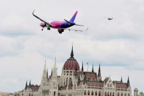 New low-cost airline Wizz Air Abu Dhabi is to launch operations from the Emirati capital in the second half of 2020. An Airbus A321 of Hungary-based Wizz Air is seen flying over the parliament building in Budapest on May 1, 2016