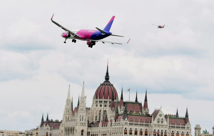 New low-cost airline Wizz Air Abu Dhabi is to launch operations from the Emirati capital in the second half of 2020. An Airbus A321 of Hungary-based Wizz Air is seen flying over the parliament building in Budapest on May 1, 2016