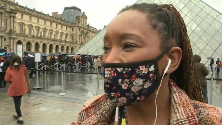 Tourists react as Paris's Louvre museum remains shut over coronavirus fears