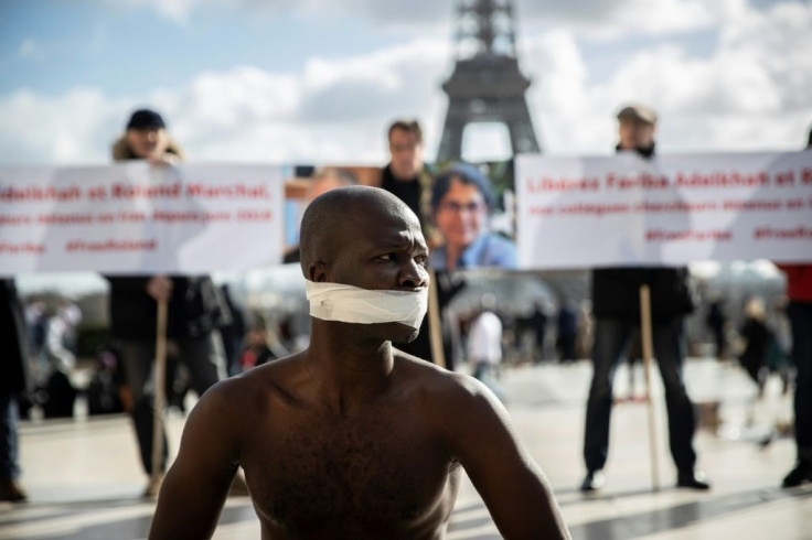 Senegalese artist Alioune Diagne perfoms in Paris during a gathering in support French-Iranian academic Fariba Abdelkhah and French academic Roland Marchal, detained in Iran