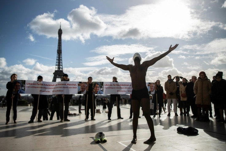 Their supporters have demonstrated in Paris in support of the two academics