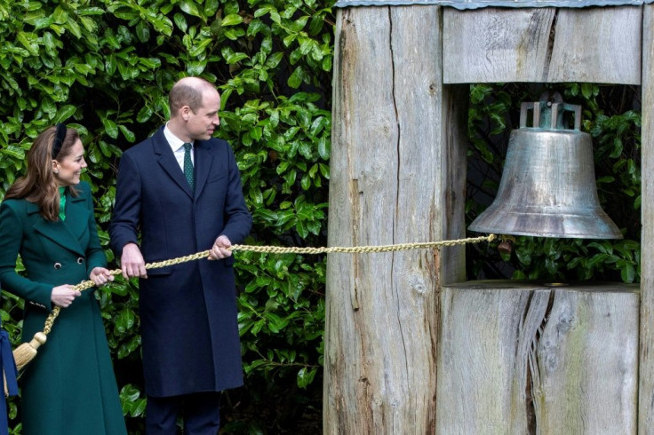The royal couple ring the Peace Bell in the grounds of the President's residence in Phoenix Park, Dublin