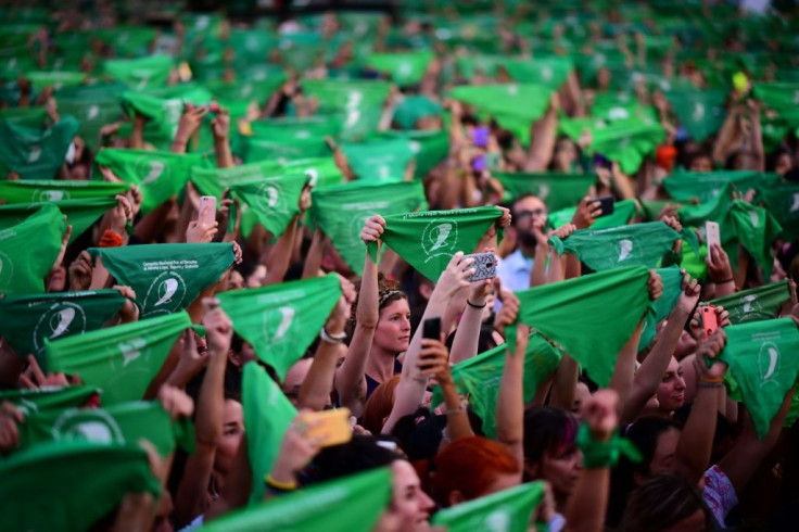 Thousands of women in Buenos Aires hold green scarves demanding the decriminalization of abortion in Argentina, on February 19, 2020