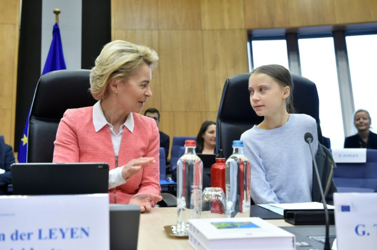 Greta Thunberg (R) calls the climate law championed by European Commission President Ursula von der Leyen (L) insufficient, or in her words, "surrender"