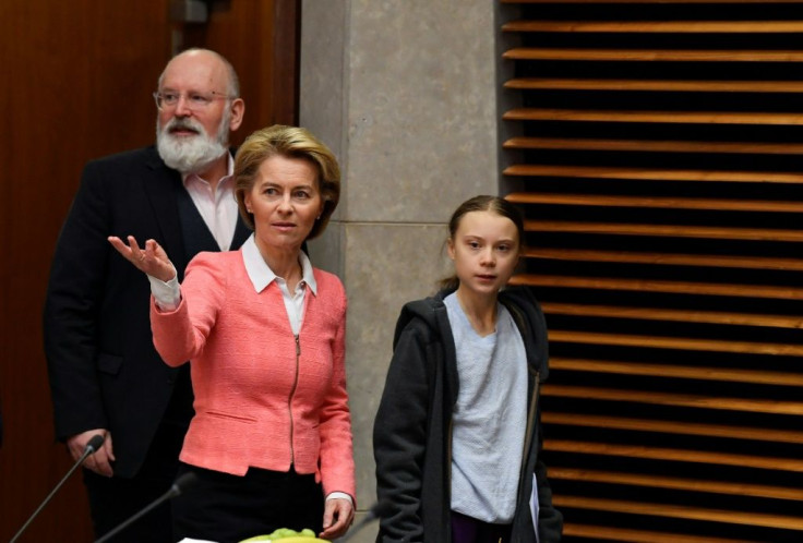 Greta Thunberg, seen here with European Commission President Ursula von der Leyen Vice President Frans Timmermans, is urging faster action from the EU