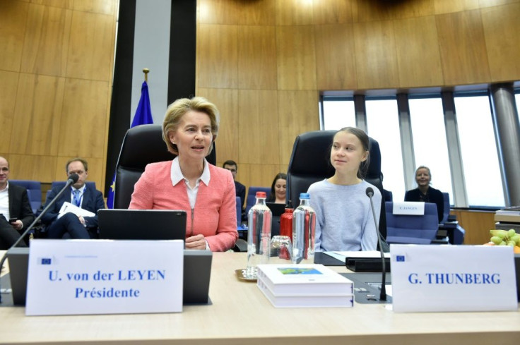 European Commission President Ursula von der Leyen (C) announced a new draft law that Brussels has hailed as the cornerstone of Europe's "Green Deal" to fight climate change