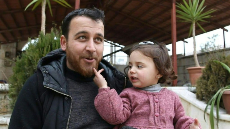 In Syria's Idlib, there's no escaping the war, so Abdullah al-Mohammed says the only way he found to reassure his daughter Salwa was to turn the shelling into a game.