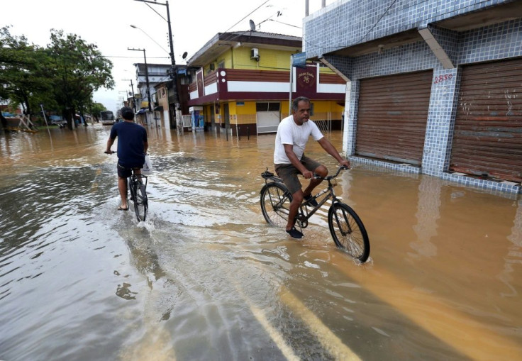 A flooded street in the Morro do Macaco Molhado favela in Guaruja, in Brazil's Sao Paulo state