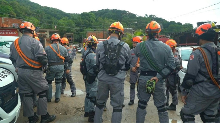 Rescuers search for survivors after a landslide leaves 19 dead in Brazil