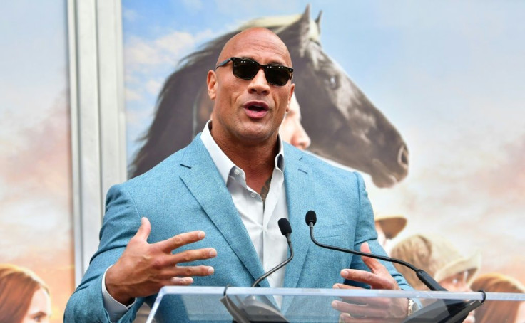 Netflix is reassessing plans to shoot portions of a new Dwayne "The Rock" Johnson movie in the same country, according to reports