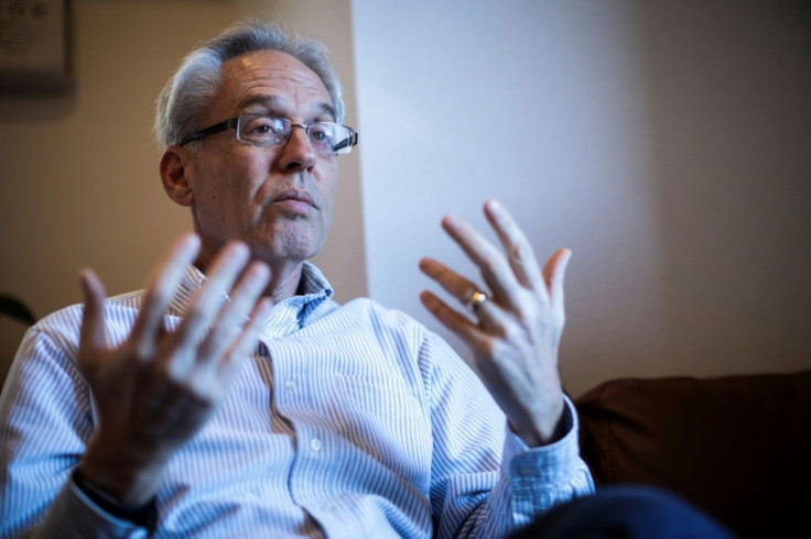 Greg Kelly was arrested at the same time as former Nissan boss Carlos Ghosn